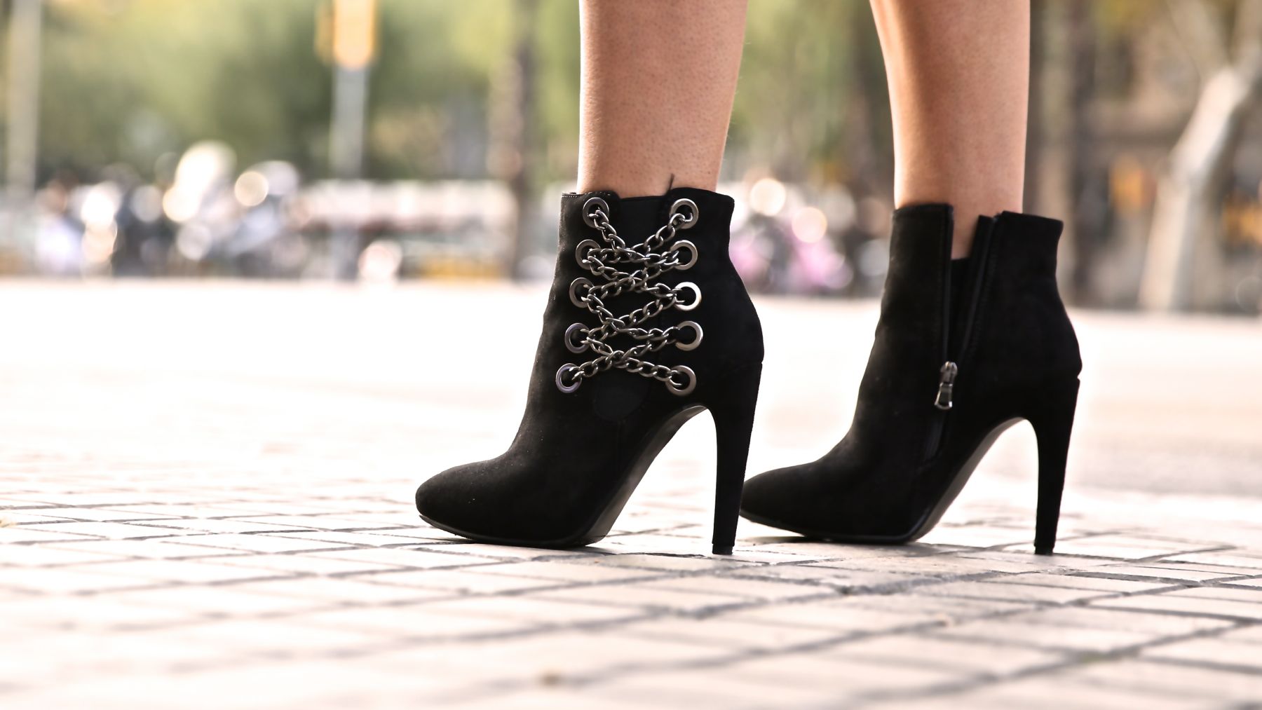 Chic rocky look, leather and chain boots