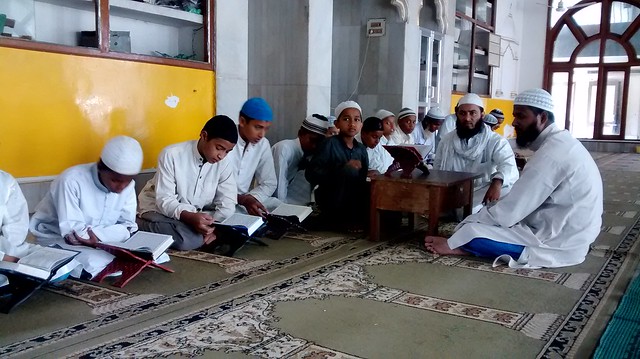 Students attend a teaching session at Asom Markazul Ulum Guwahati at Islampur