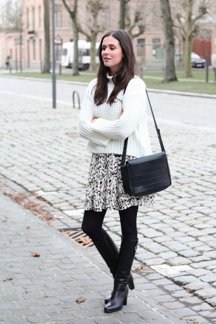 office appropriate outfit: knee boots, sweater, printed skirt