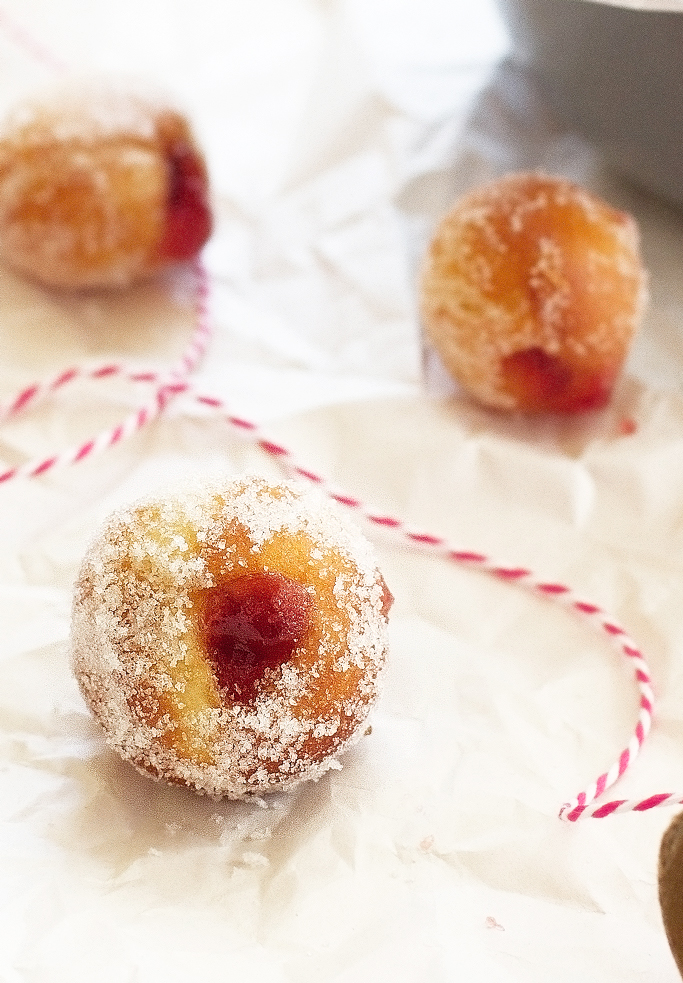 Strawberry Jelly Donut Holes - better than any donut shops version and easy step by step picture so you can make it at home! #doughnuts #donuts #donutholes #jellydonuts | littlespicejar.com