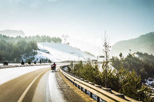road travel winter light sky woman cloud white snow girl bicycle fog turkey cycling asia day snowy walk sunny roadtrip adventure traveling bicycletouring traveler biketouring