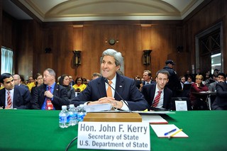 Secretary Kerry Surveys Senate Foreign Relations Committee Members Before Testifying in Washington
