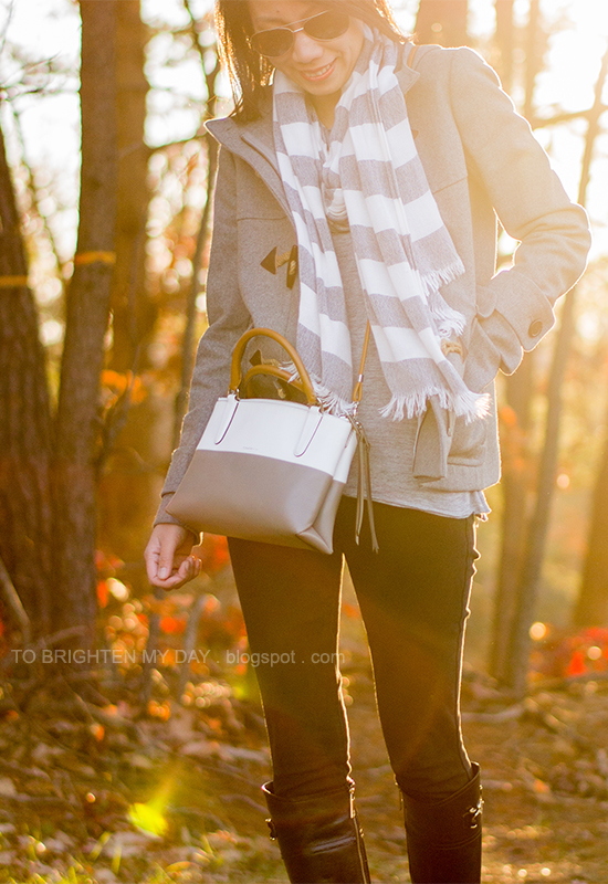 gray and white wide striped scarf, gray toggled coat, colorblocked crossbody bag, black riding boots