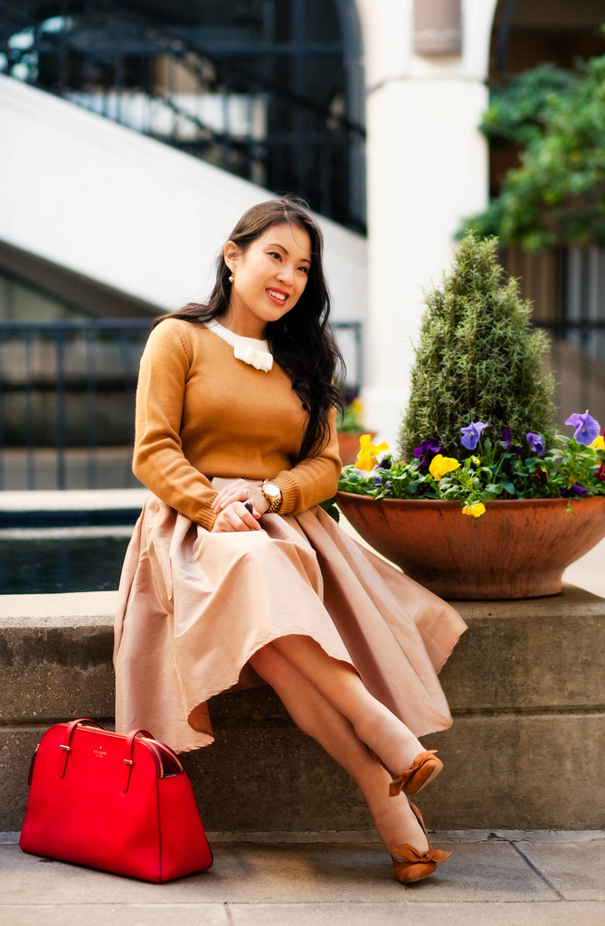 https://cuteandlittle.com | petite fashion lifestyle blog | mustard bow sweater, chicwish champagne a-line midi skirt, bow pumps, kate spade red bag | champagne neutrals outfit