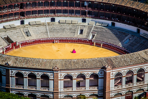 above pink building eye birds sport stone architecture high spain ancient europe cityscape view roman stadium bull arena seats bleachers malaga matador amphitheather