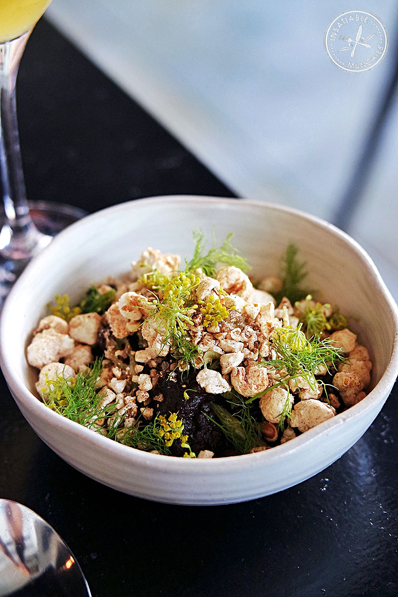 Morcilla with sweet apple, fennel and salted cinnamon popcorn