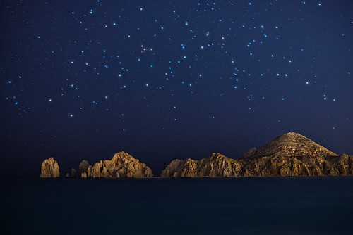 ocean travel blue vacation sky mountain nature water night dark stars landscape mexico outdoors star los cabo rocks arch background space landmark scene lucas adventure formation astronomy baja lands milky starry cabosanlucas cabos