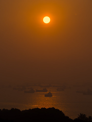 morning trees sea sky sun water vertical clouds sunrise buildings reflections haze singapore ships olympus zd 40150mm microfourthirds omdem5