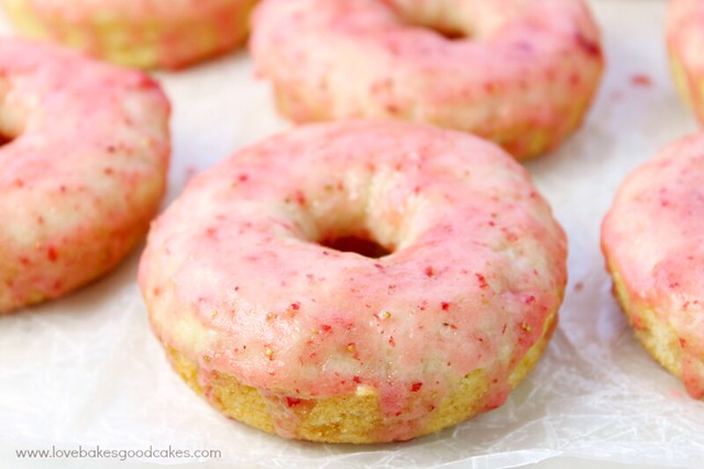 These Vanilla Cake Donuts with Strawberry Glaze are perfect for breakfast or a snack! They're easy to make and the glaze is made with fresh strawberries! So yummy!