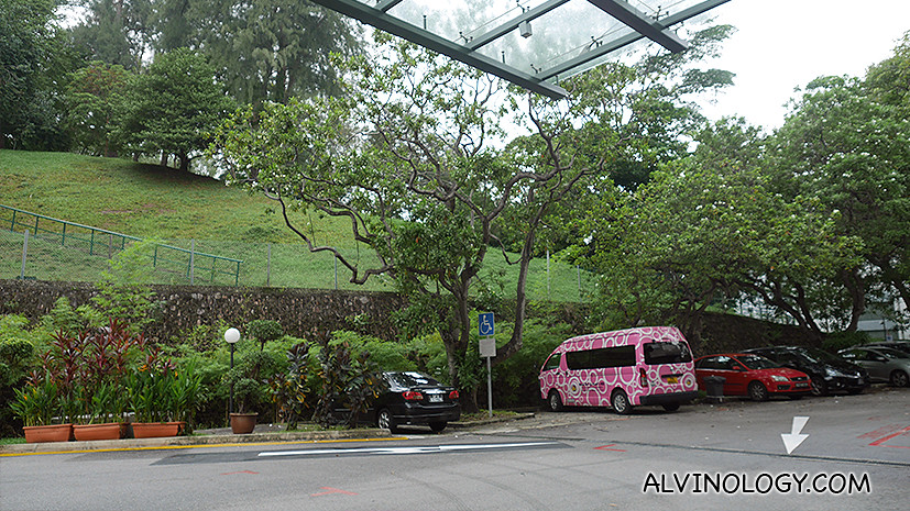Spacious carpark at the foot of Pearl's Hill, the pink van is the shuttle bus