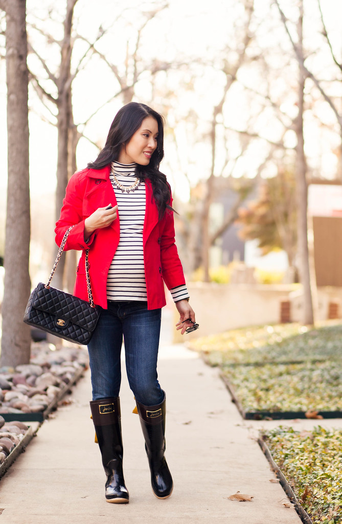 <a href="https://cuteandlittle.com" rel="nofollow">cuteandlittle.com</a> | petite fashion blog | red trench, black / white striped turtleneck, citizens maternity jeans, joules evedon black bow rain bow boot wellies | fall outfit