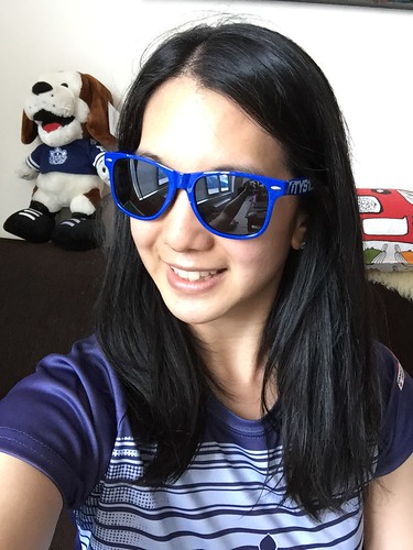 Mei wearing #TYS10k race shirt and sunglasses.