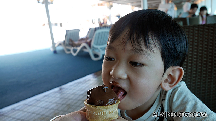 Asher enjoying a chocolate cone 