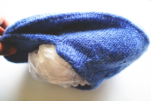 Knit flat cap profile