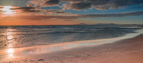 uk sunset sea sunlight seascape beach water wales clouds landscape sand waves view unitedkingdom hills harlech