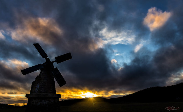 Windmill in front of sunset