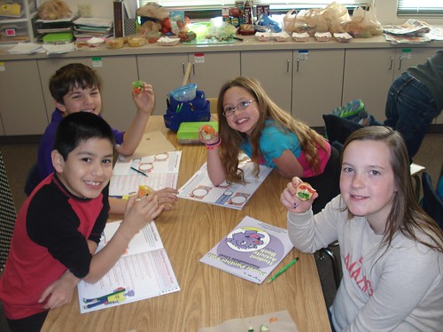 Kansas students create “Hummus Heads”, an activity used to encourage sampling new foods.