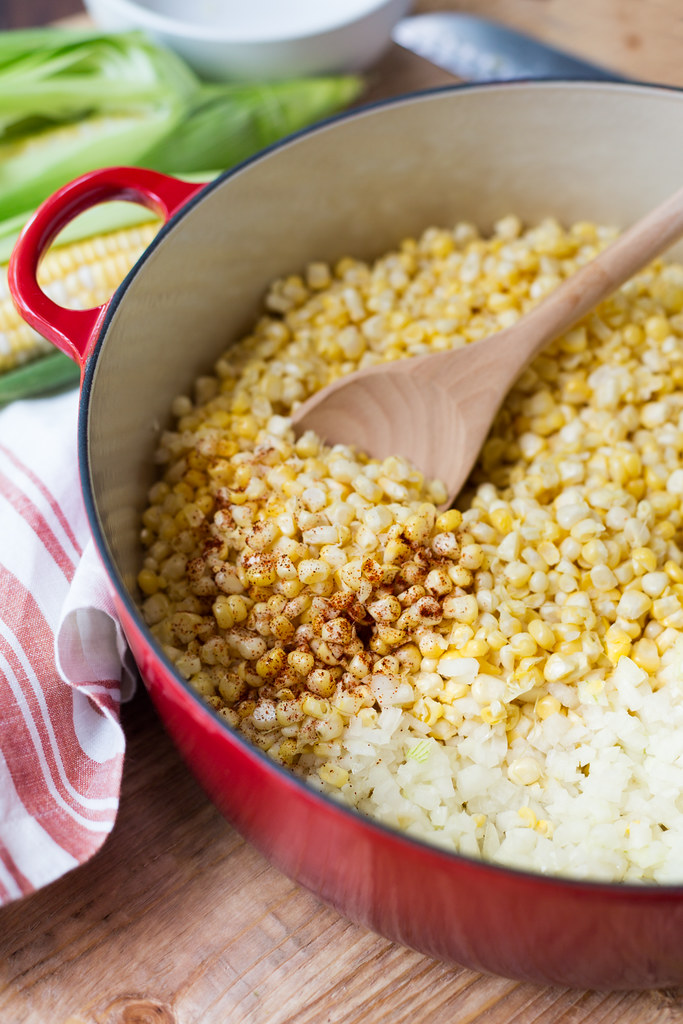 corn kernels and onions in pot