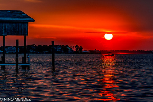 sunset perdido bay pensacola florida sony a7 rokinon 135mm f56 water sun beach dock boat colors