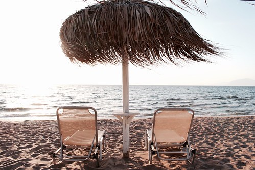 ocean blue sunset sea summer sun beach water set umbrella greek golden sand paradise crystal beds clear greece vacations