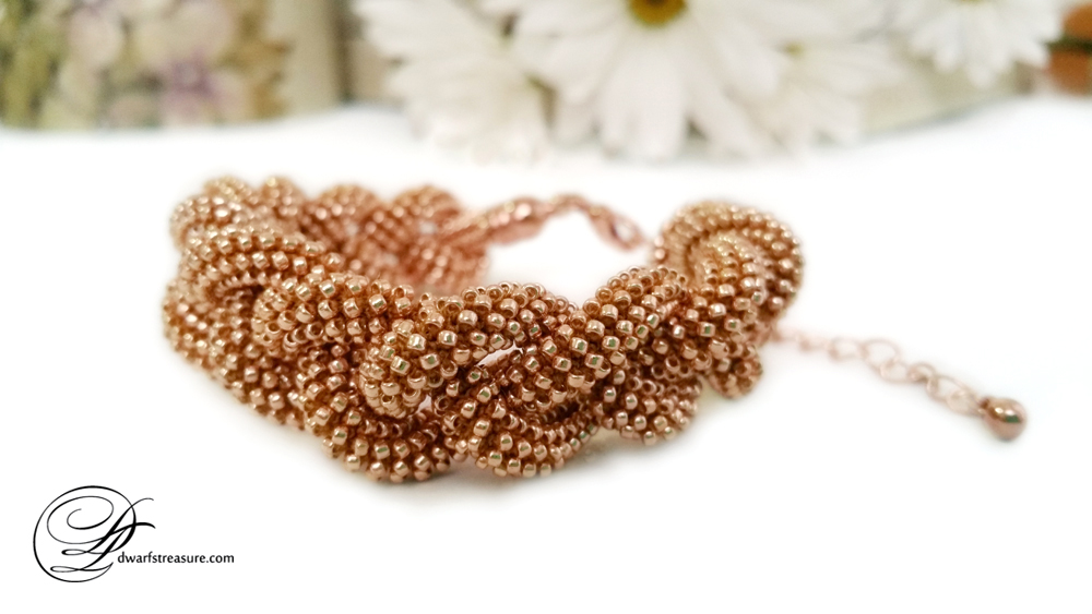 Luxurious pink gold seed bead crochet rope bangle