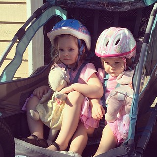 First family bike ride! These girls weren't sure what to expect. But they loved it, especially since our destination was the ice cream store!