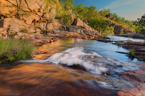 light red water waterfall nt australia cliffs cascades outback kakadu northernterritory escarpment rockhole