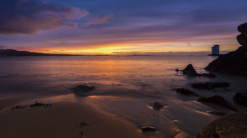scotland uk portellen carraigfhada islay hebrides water lighthouse sky beach cloud clouds sea seascape sunrise