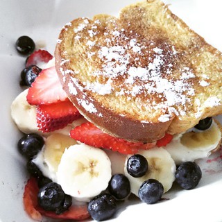 Yum! "I'm Stuffed French Toast" from #Talias Take out... when you're too lazy to go out for #breakfast #FrenchToast #strawberries #blueberries #banana