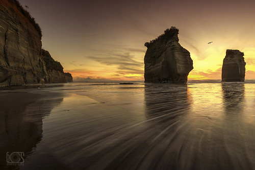 sunset sea newzealand sun seascape beach landscape rocks shadows shore nz taranaki 3sisters tongaporutu canoneos5dmarkiii ef1635mmf4lisusm