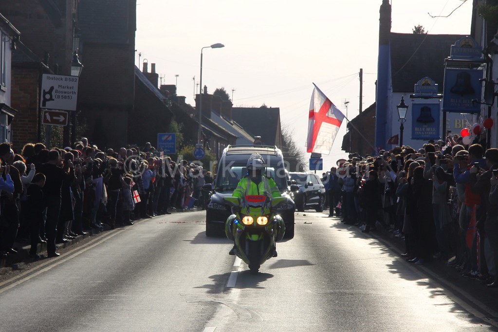 The funeral cortege of King Richard III makes it way through the Leicestershire village of Desford