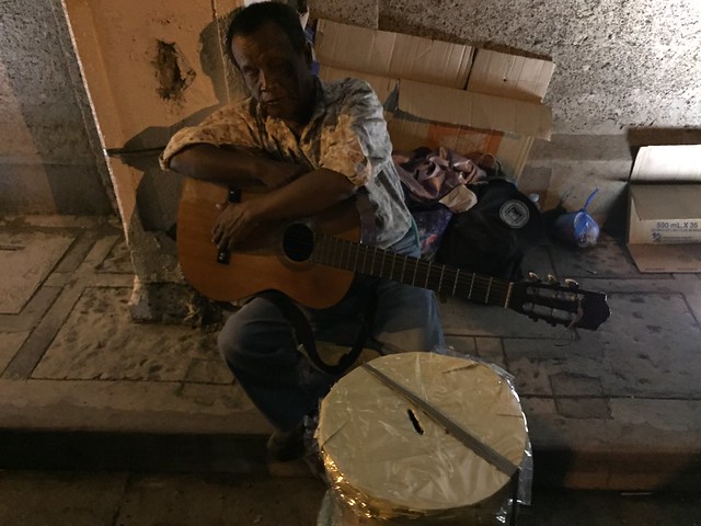 Street musician, beggar