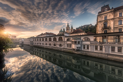 slovenia ljubljana europe reflection river architecture medieval oldcity oldtown clouds sunrise city water columns arches church