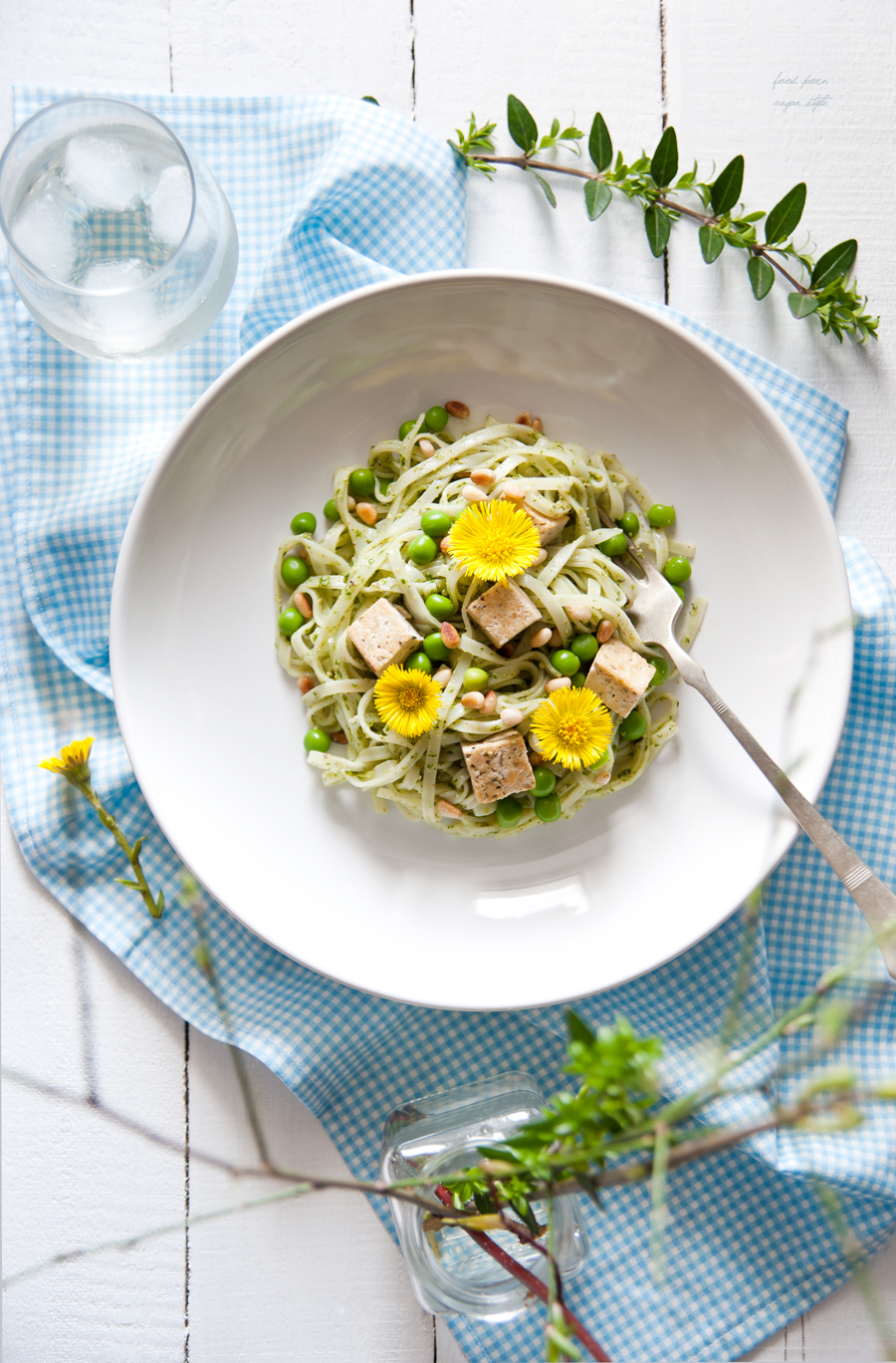 Spring noodles with pesto,tofu,peas and coltsfoot flowers