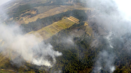 Aerial footage of the wildfire tackled by Surrey Fire and Rescue Service near Pirbright