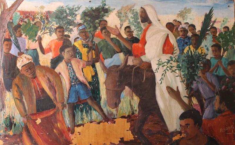 palm-sunday-an_african_jesus_christ_s_triumphal_entry_into_jerusalem_riding_on_a_donkey_to_the_enthusiasm_of_the_crowds