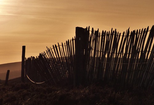 sunset mountains silhouette fence lochindorb