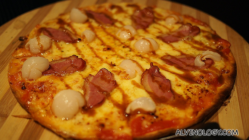 Pizza Nowhere tickles your tastebuds with sweet and savoury sensations. An unusual combination of smoked duck, lychees, mozzarella, cheddar. 