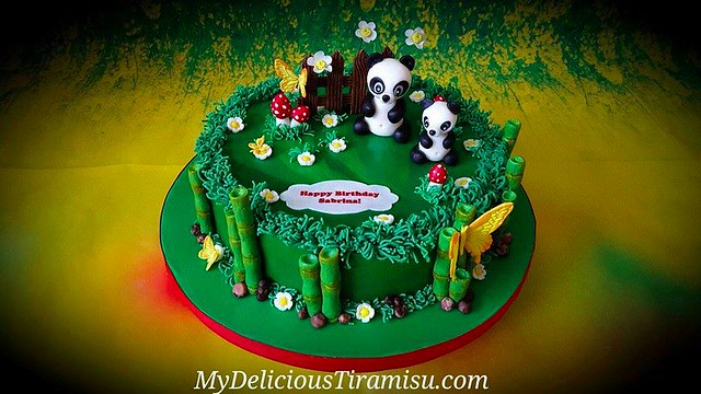 Adorable Panda Bears on the Flower Meadow Cake by Oksana Krasulya of My Delicious Tiramisu LLC