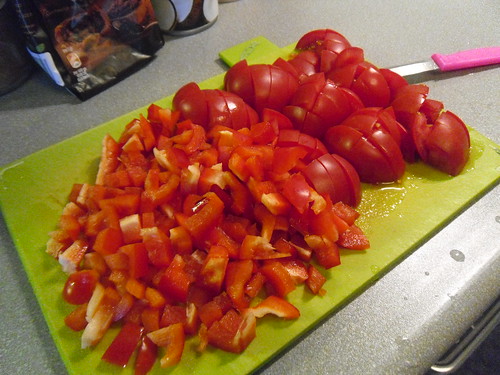 Red bell pepper and tomatoes sliced and diced