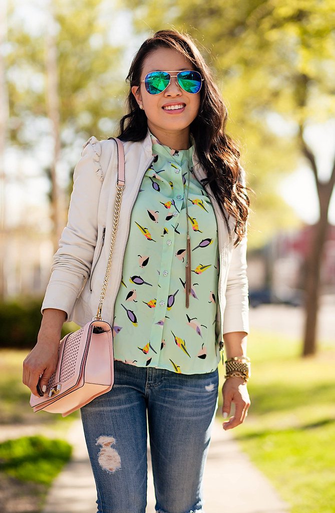 cute & little blog | petite fashion | white leather jacket, sheinside green birds print chiffon blouse, ag distressed jeans, pink suede pumps, minkoff pink love crossbody, blue mirror aviators | spring outfit