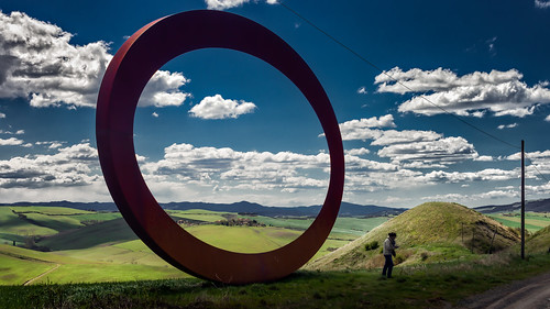 blue shadow red sky italy sculpture green clouds circle nikon outdoor volterra spooky tuscany round ellipse mauro d800 staccioli landscapt