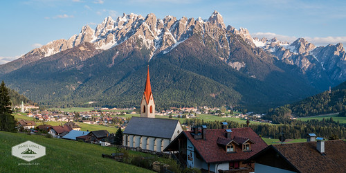 city italy panorama mountains church town dolomites southtyrol dobbiaco toblach
