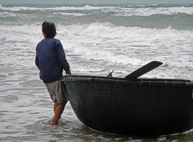 Fishing Coracles Landing at the Beach in Hoi An