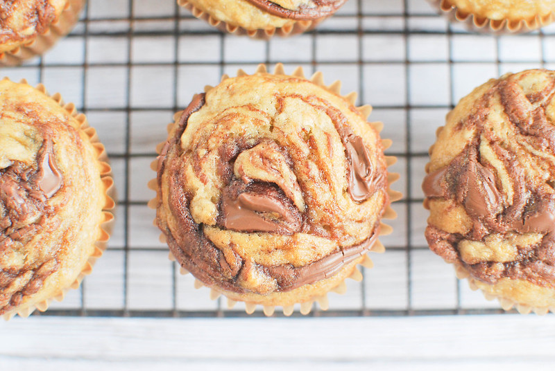 Banana Muffins with Nutella Swirl - soft and fluffy banana muffins with a nutella swirl on top! 