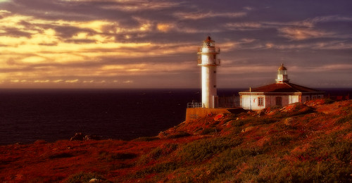 sunset sea cliff sun sunlight lighthouse death coast seaside europe dusk path atlantic galicia western cape seashore headland costadamorte muxia touriñan