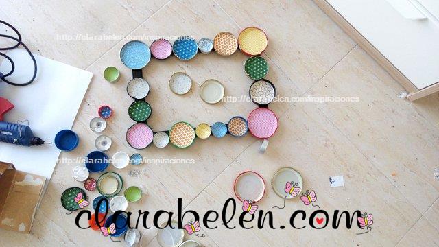 How to decorate a frame with jar lids