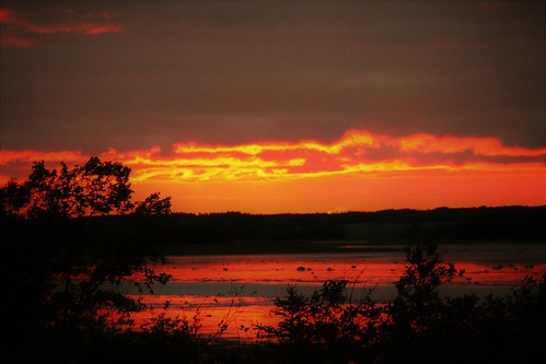 sunset bay seaside shore water ocean sea clouds orange