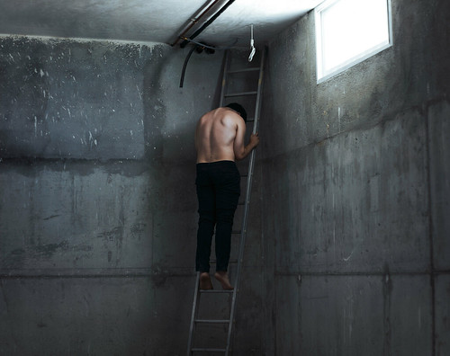 project ladder conceptual stuck boy photo concept photography indoors basement light feelings fine art