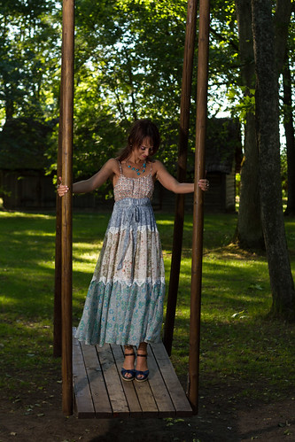 model woman dress nature trees tree swing swinging swings blue bluedress shoes necklace outdoor